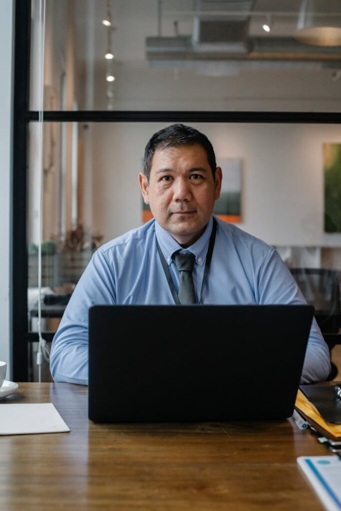 The Art of Drawing Readers In: Your attractive post title goes here Confident ethnic man wearing formal clothes and tie working at netbook while sitting at table in workspace